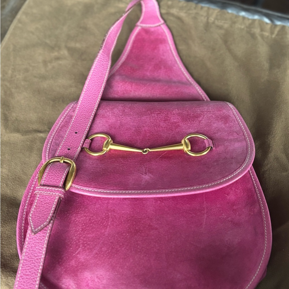 Gucci horsebit backpack saddlebag.  Fuscia calfskin leather.  Reversible strap.